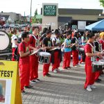 A drumline band plays outdoors at the 2011 Nextfest Opening Ceremonies.